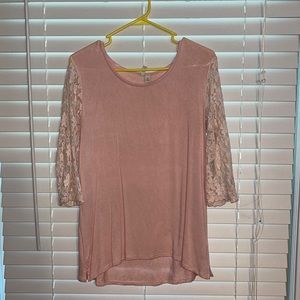 Size Small (fits like Medium) pink blouse with pink lace sleeves.